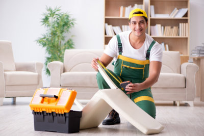 man cleaning a room